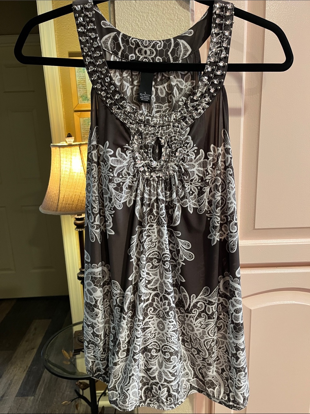 Embellished Black Sleeveless Blouse with White Lace Print